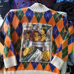 Graphic argyle turtleneck sweater